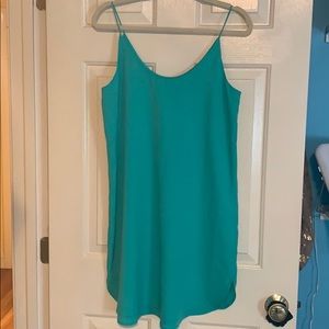 Cute cami dress, never worn. Beautiful color!